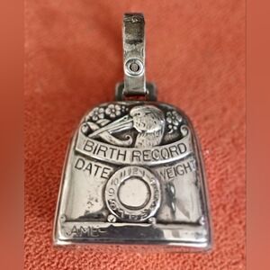 Vintage sterling silver birth record bell rattle